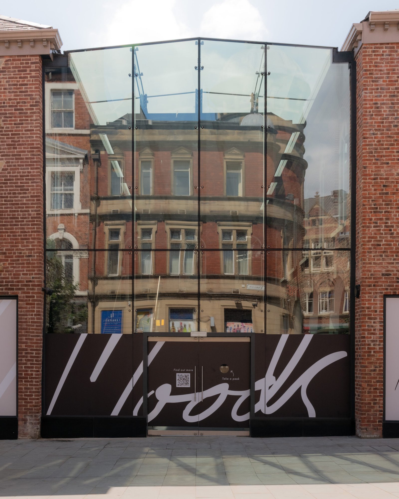 The glass entrance to First White Cloth Hall on Kirkgate, home of Moods Leeds