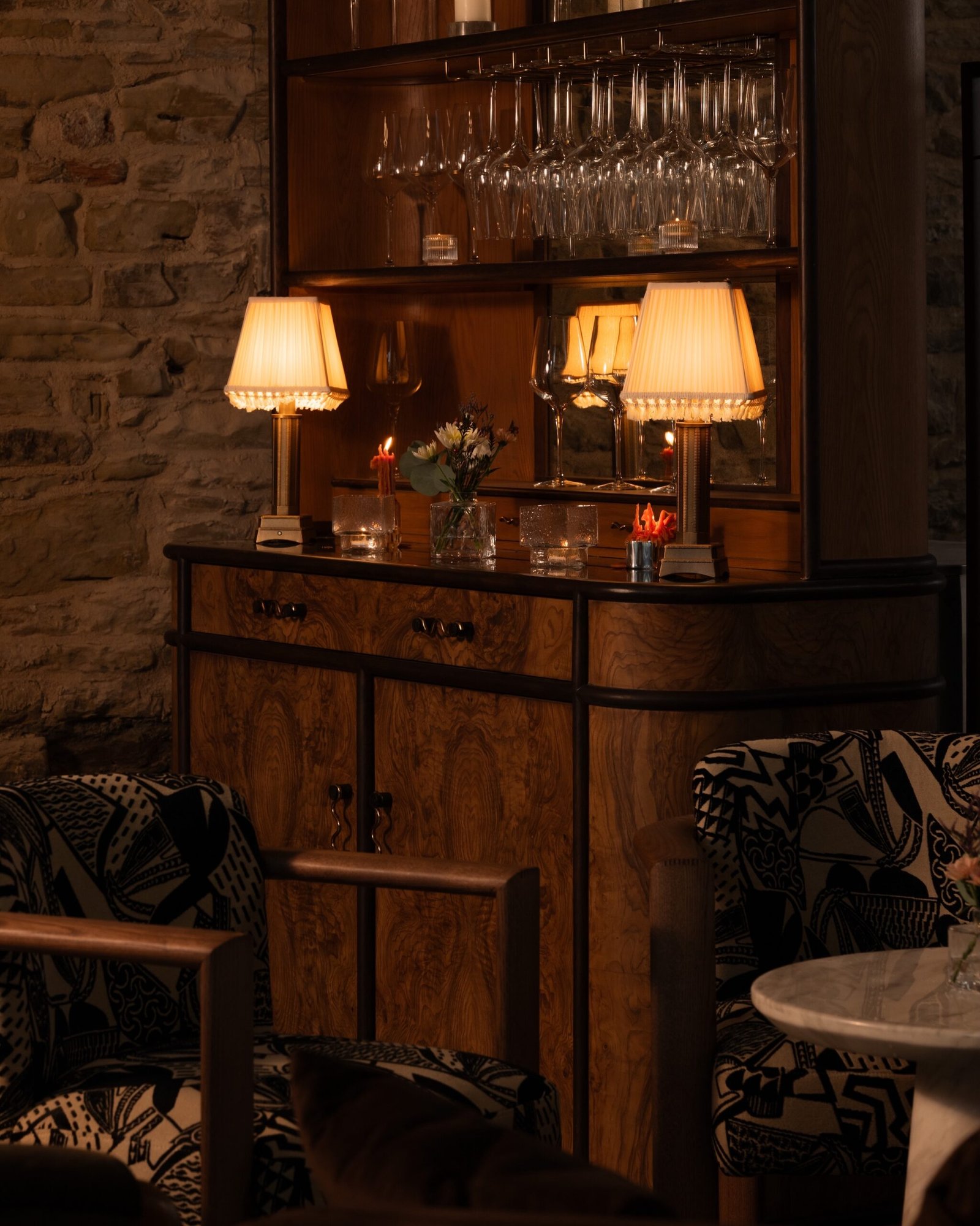Warm lamplight and walnut inside Moods Leeds